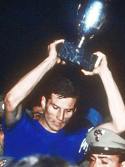 Captain Giacinto Facchetti celebrates Italy's UEFA Euro 1968 victory.